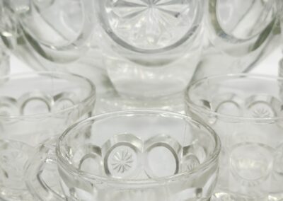 Glass punch bowl with matching cups set.