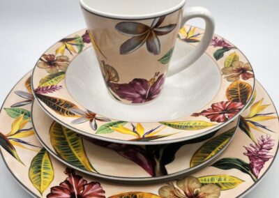 Floral-patterned dinnerware set with cup.