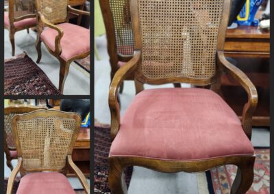 Vintage wooden chair with pink cushion.