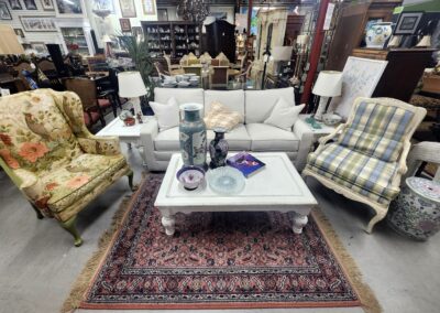 Vintage furniture set in cozy antique shop.