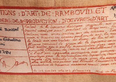 Art reproduction label with detailed text.