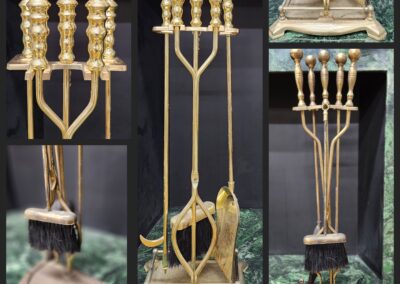 Gold fireplace tool set on green marble.