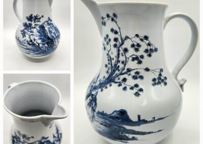 White porcelain pitcher with blue floral design.