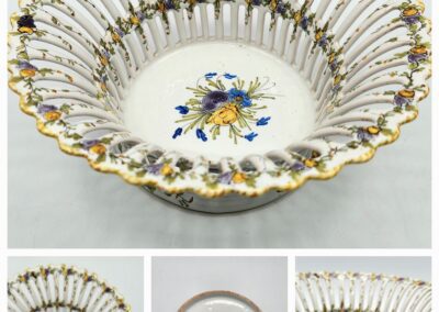 Ornate white ceramic bowl with floral design.