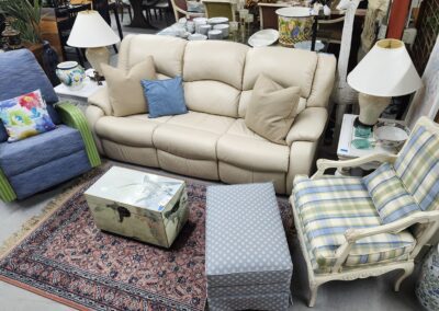Living room furniture set with patterned rug.