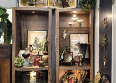 Eclectic interior with decorative art and furniture.