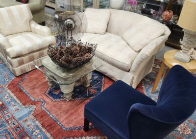 Cozy living room with assorted seating furniture.