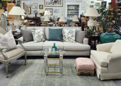 Living room furniture set in showroom.