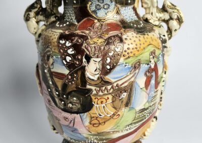 Ornate vase with colorful, detailed warrior design.