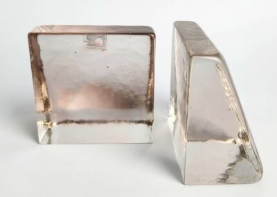 Two transparent, rectangular glass blocks displayed.