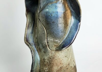 Abstract ceramic sculpture with blue and brown.