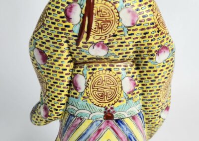 Colorful ceramic figure with intricate patterns.