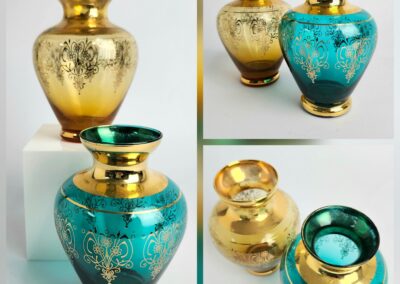 Gold and turquoise decorative vases with patterns.
