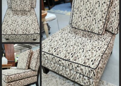 Patterned upholstered chair with geometric design.