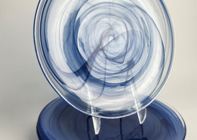 Blue and white swirled ceramic plates.