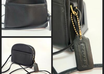 Black leather crossbody bag with tag.