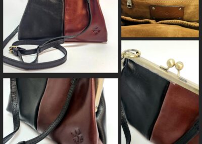 Two-tone leather handbag with metal clasp.