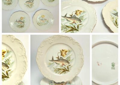 Decorative plates with fish and floral design.
