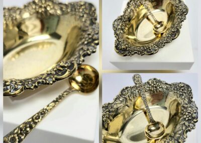 Ornate gold dish with decorative spoon.