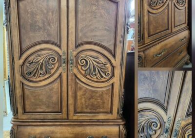 Ornate wooden armoire with detailed carvings.