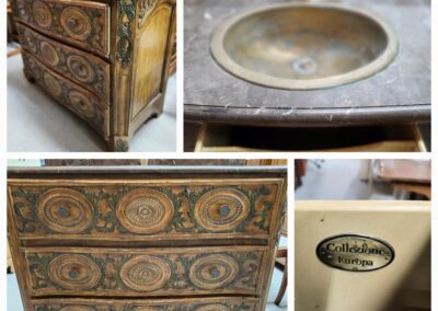 Ornate wooden dresser with integrated sink.