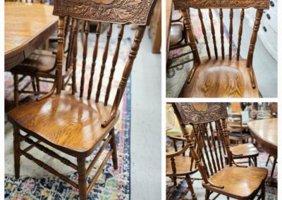 Ornate wooden chairs with carved backrests.
