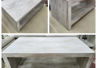 Rustic wooden coffee table with storage shelf.