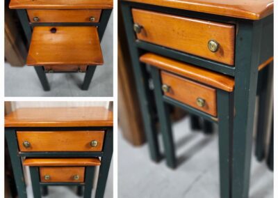 Wooden nesting tables with drawers.