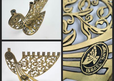 Ornate brass menorah with intricate design.