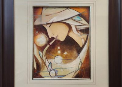 Framed abstract painting with geometric shapes.