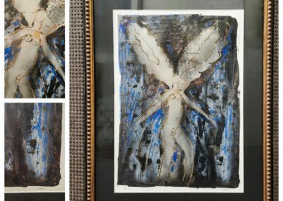 Framed abstract painting with winged figure.