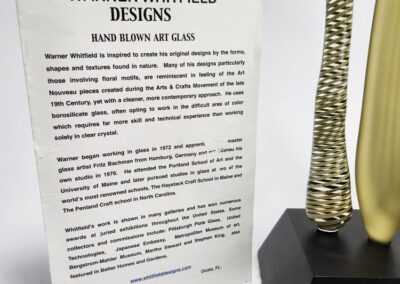 Art glass description and spiral sculpture display.