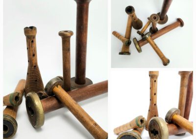 Antique wooden textile mill bobbins assortment.