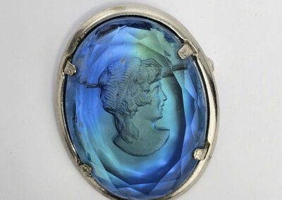 Blue cameo brooch with engraved profile.
