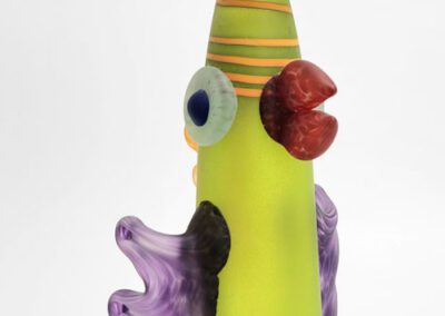 Colorful abstract glass sculpture with whimsical design.