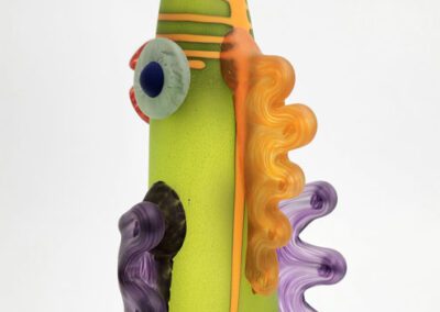 Colorful abstract glass sculpture with wavy patterns.