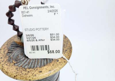 Studio pottery with price tag attached.