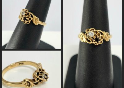 Gold ring with black and white stones.