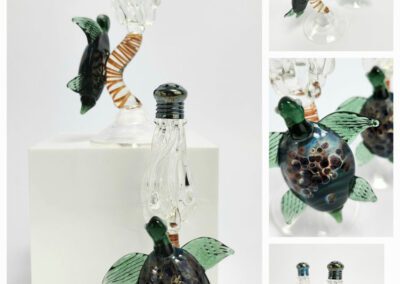 Glass turtle-shaped decorative bottle set.