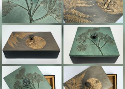 Decorative boxes with embossed floral designs.
