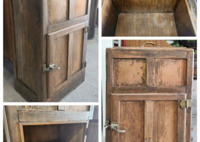 Rustic wooden cabinet with open compartments.
