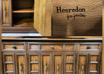 Wooden Henredon cabinet with open door.