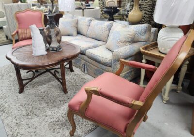 Furniture showroom with chairs and sofa display.