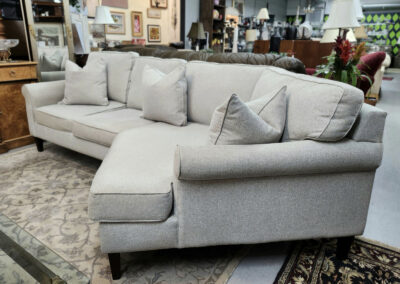 Light gray sectional sofa with chaise