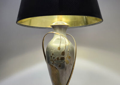 Ornate silver and gold table lamp