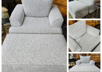 Gray upholstered armchair with matching ottoman