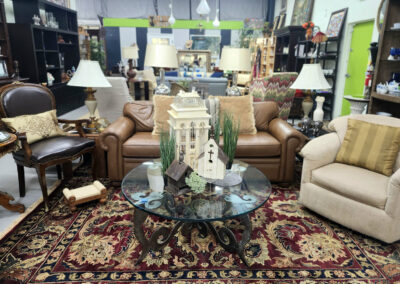 Living room furniture display with glass table