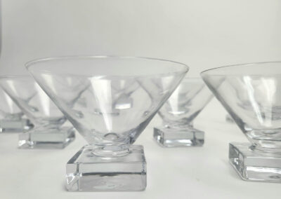 Clear glass martini glasses with square bases