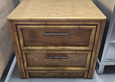 Wooden two-drawer nightstand with metal handles