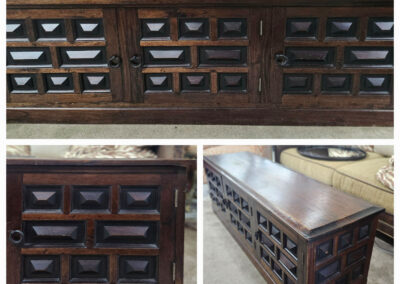 Dark wooden coffee table with geometric panels
